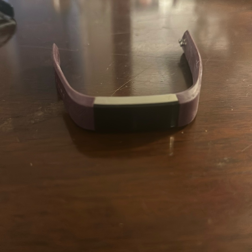 Purple FitBit Watch
